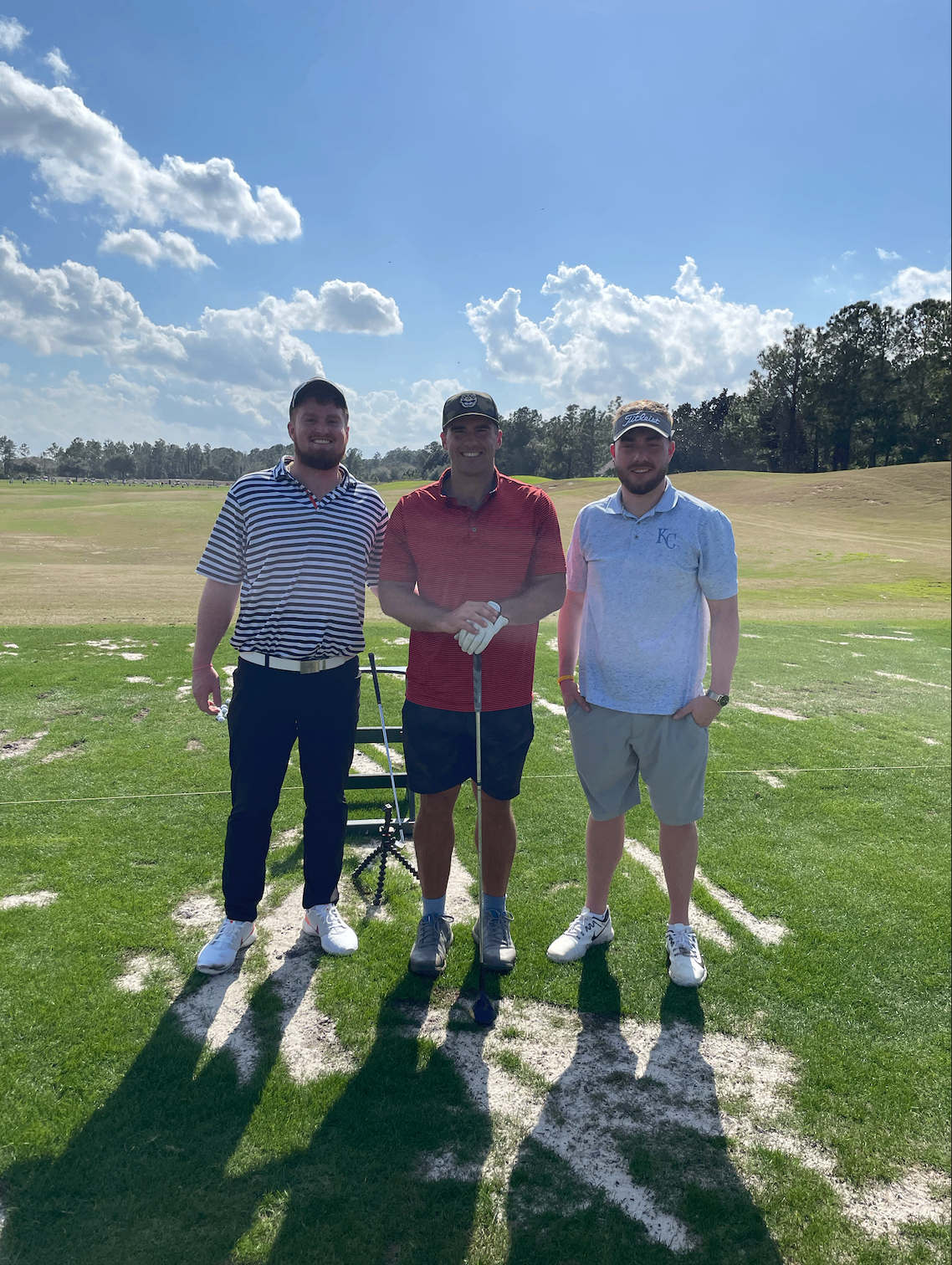 Stephen Hopper with golfers on the range